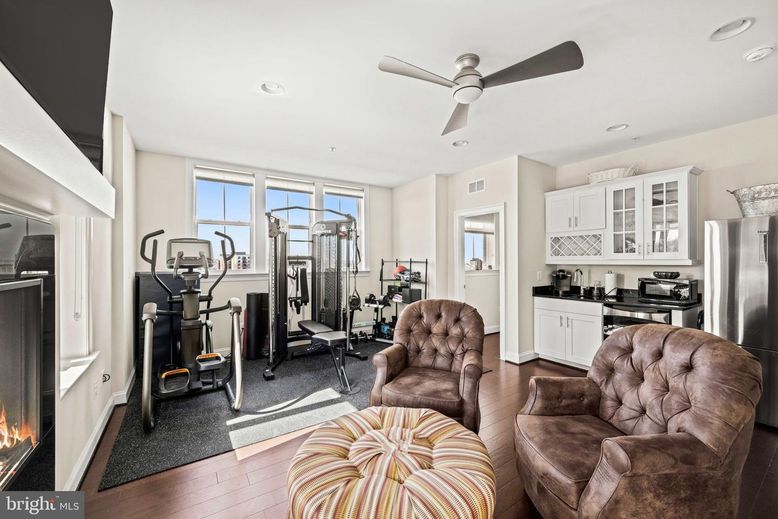 Fireplace, Fitness Equipment, Interior, Kitchen, Recessed Lighting, Wood Texture Flooring