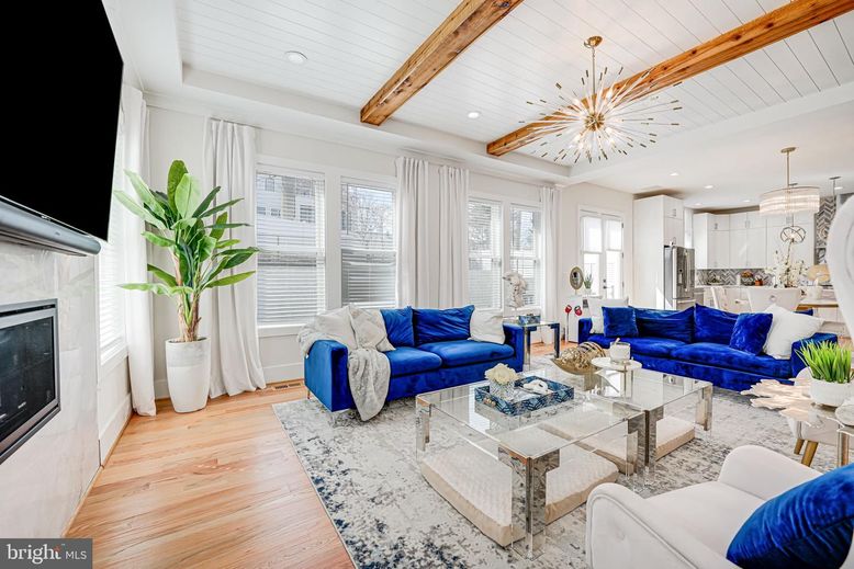Fireplace, Interior, Kitchen, Living room, Pendant Lights, Recessed Lighting, Stainless Steel Appliances, Wooden Beams, Wood Texture Flooring