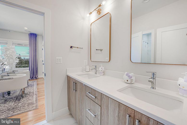 Bathroom, Dual Sink Vanities, Interior, Recessed Lighting, Wood Texture Flooring