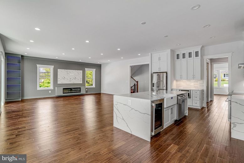 Interior, Kitchen, Marble Walls, Recessed Lighting, Stainless Steel Appliances, Wood Texture Flooring
