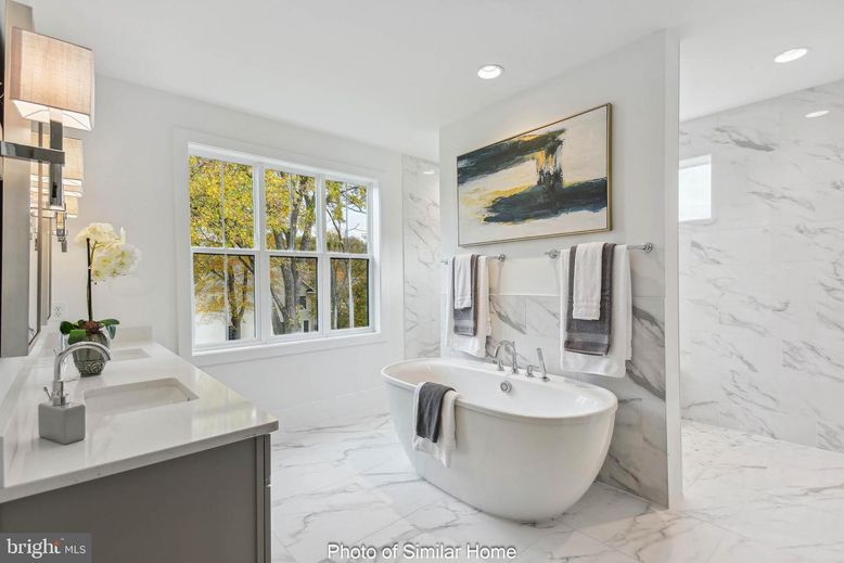 Bathroom, Dual Sink Vanities, Free Standing Baths, Interior, Marble, Marble Walls, Recessed Lighting
