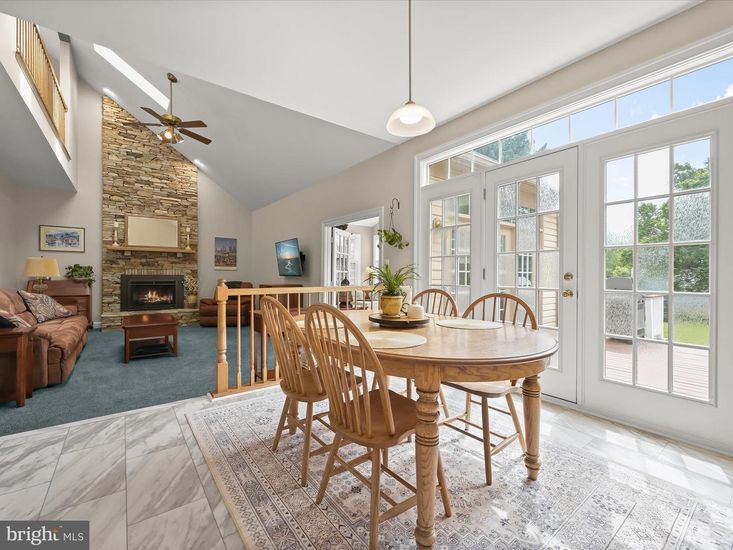 Dining room, Fireplace, Interior, Living room, Marble, Pendant Lights, Stone Walls