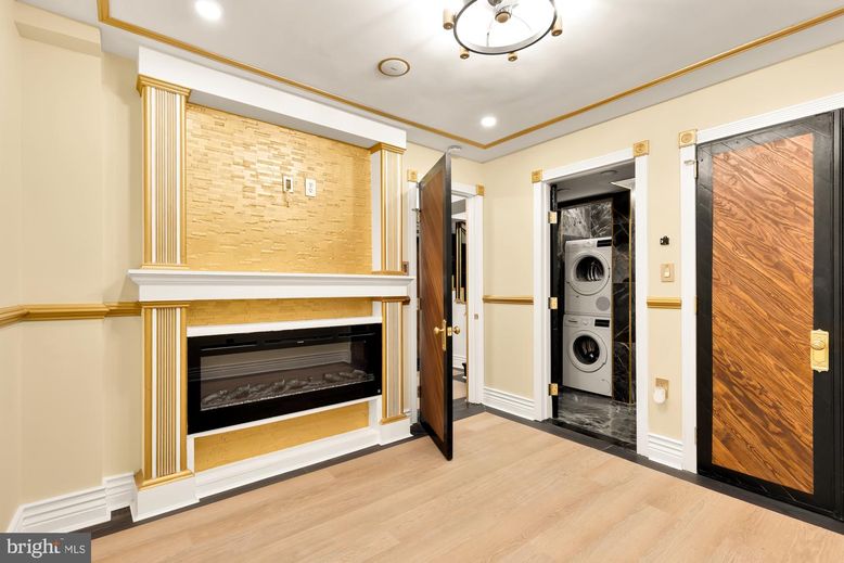 Fireplace, Interior, Recessed Lighting, Utility Closets, Washer, Wood Texture Flooring