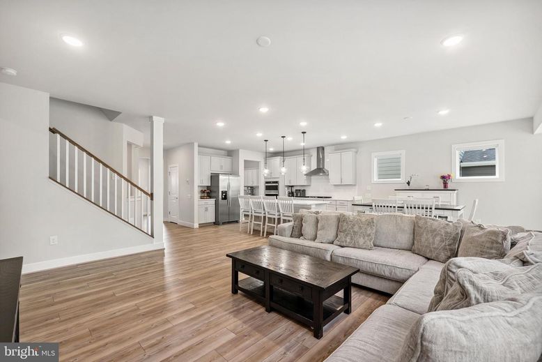 Dining room, Interior, Kitchen, Living room, Pendant Lights, Recessed Lighting, Stainless Steel Appliances, Wood Texture Flooring