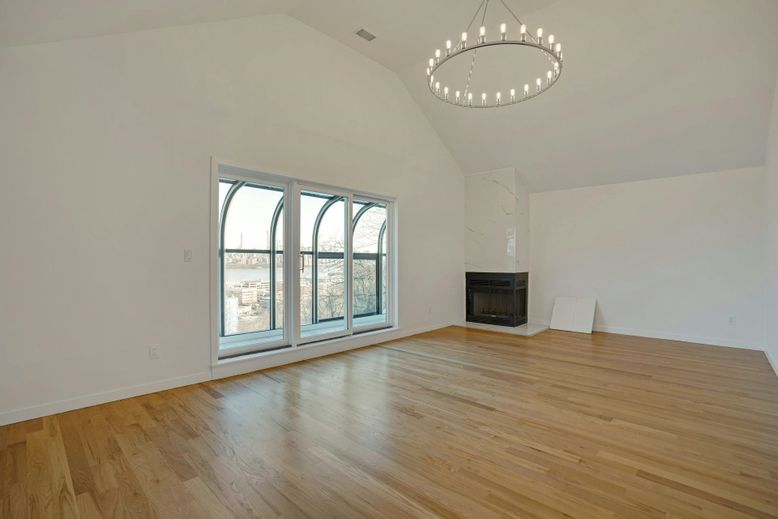 Empty room, Fireplace, Interior, Pendant Lights, Wood Texture Flooring