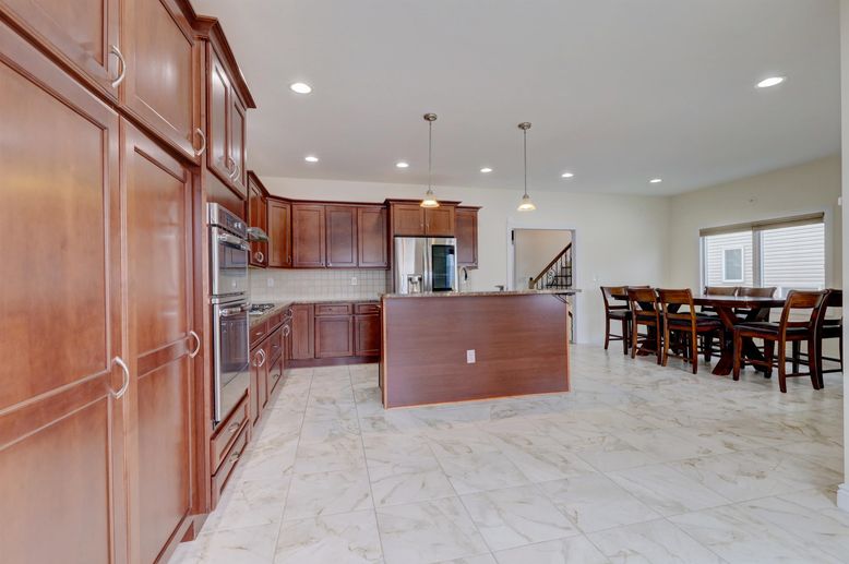 Dining room, Interior, Kitchen, Marble, Pendant Lights, Recessed Lighting, Stainless Steel Appliances