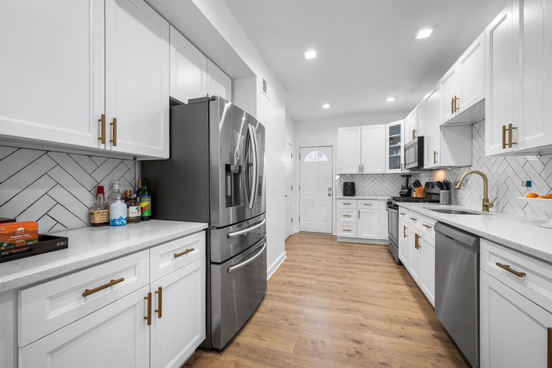 Interior, Kitchen, Recessed Lighting, Stainless Steel Appliances, Wood Texture Flooring