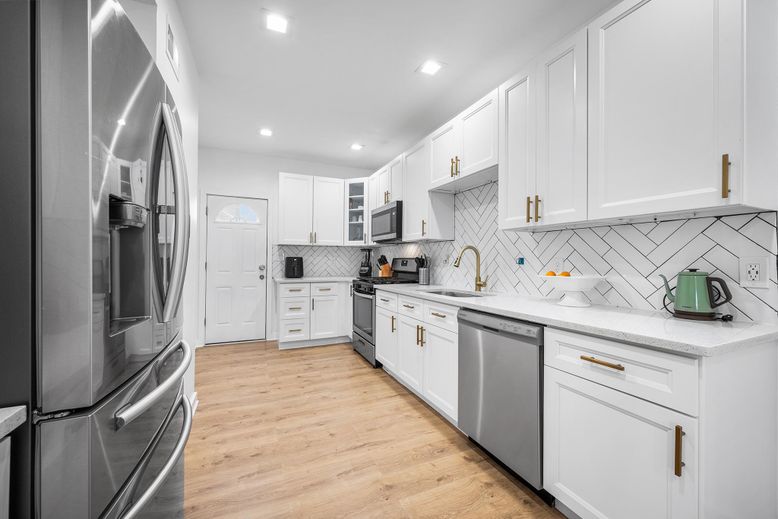 Interior, Kitchen, Recessed Lighting, Stainless Steel Appliances, Wood Texture Flooring
