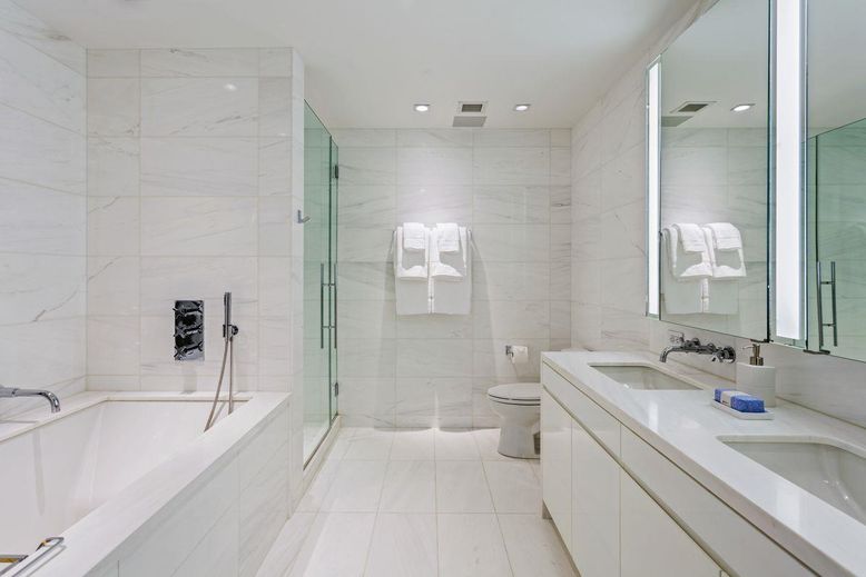 Bathroom, Dual Sink Vanities, Glass Shower, Interior, Marble Walls, Recessed Lighting