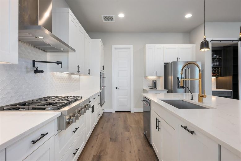Interior, Kitchen, Pendant Lights, Recessed Lighting, Stainless Steel Appliances, Wood Texture Flooring