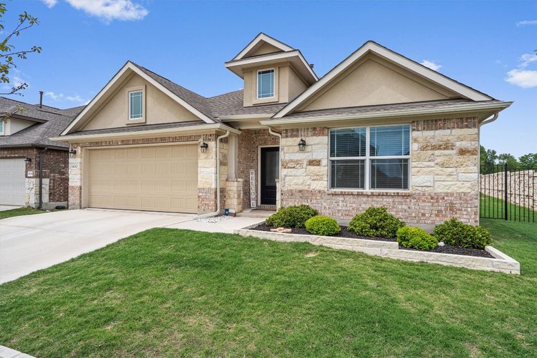 Attached, Exterior, Facade, Brick Facade, American Craftsman