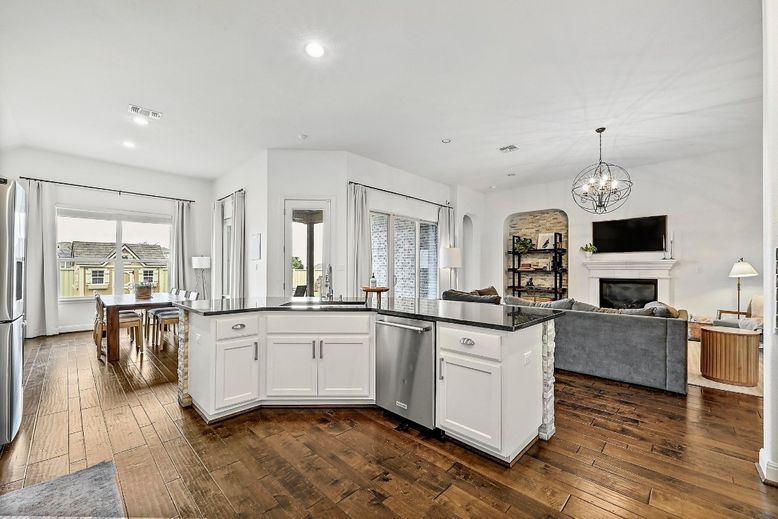 Chandelier, Dining room, Fireplace, Interior, Kitchen, Living room, Pendant Lights, Recessed Lighting, Wood Texture Flooring