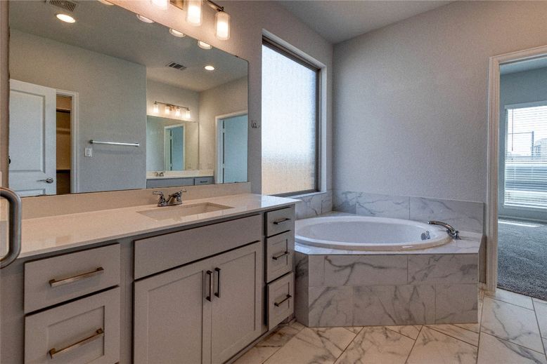 Bathroom, Dual Sink Vanities, Interior, Marble, Marble Walls, Recessed Lighting
