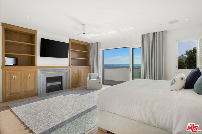 Bedroom, Fireplace, Interior, Recessed Lighting, Water, Wood Texture Flooring
