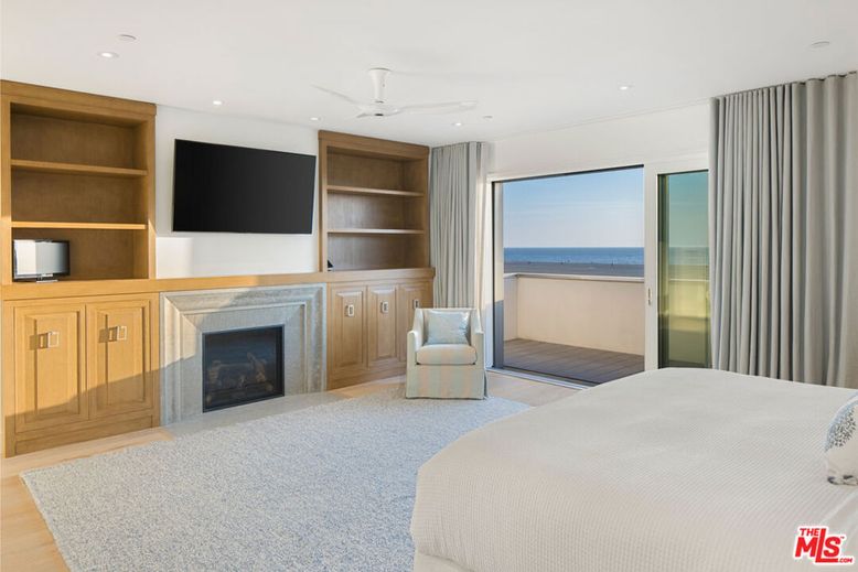 Bedroom, Fireplace, Interior, Recessed Lighting, Water, Wood Texture Flooring