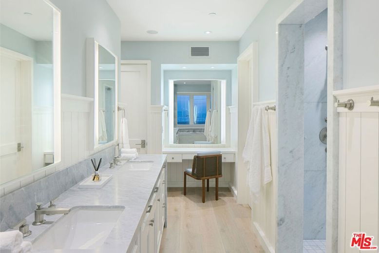 Bathroom, Dual Sink Vanities, Interior, Marble Walls, Recessed Lighting, Wood Texture Flooring
