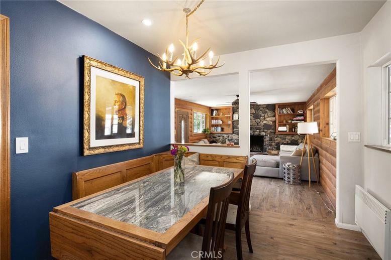 Chandelier, Dining room, Fireplace, Interior, Living room, Recessed Lighting, Stone Walls, Wood Texture Flooring