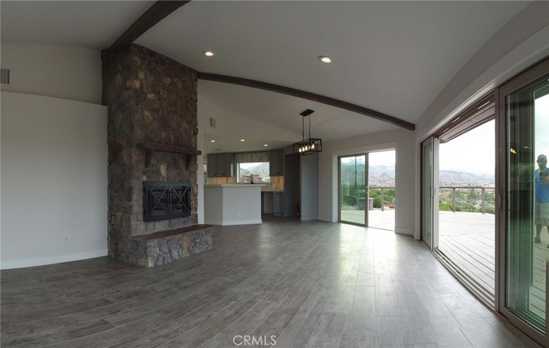 Empty room, Fireplace, Interior, Pendant Lights, Recessed Lighting, Wood Texture Flooring