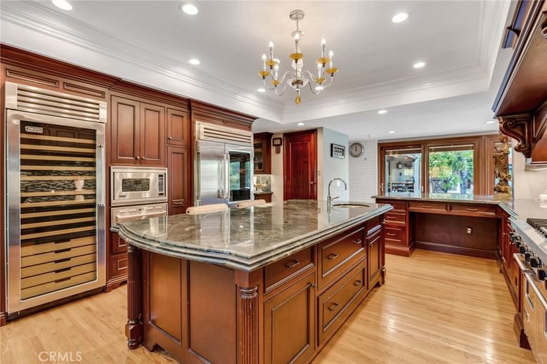 Chandelier, Interior, Kitchen, Recessed Lighting, Stainless Steel Appliances, Wood Texture Flooring