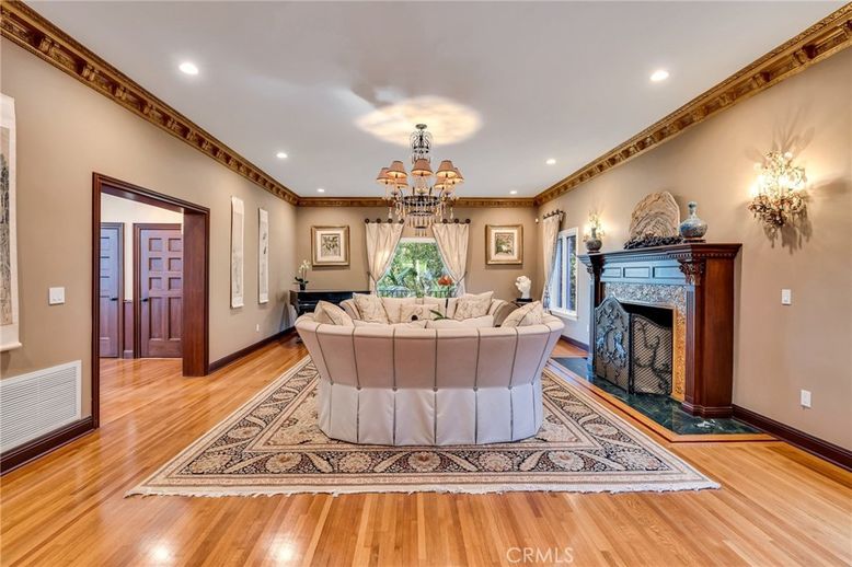 Chandelier, Fireplace, Interior, Living room, Recessed Lighting, Wood Texture Flooring