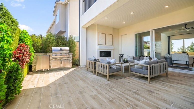Exterior, Fireplace, Recessed Lighting, Wood Texture Flooring