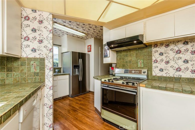 Interior, Kitchen, Stainless Steel Appliances, Tile Countertops, Wood Texture Flooring
