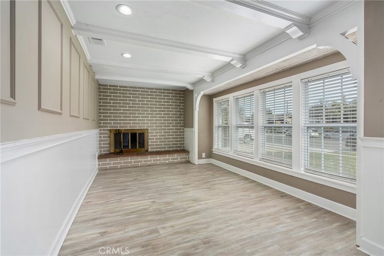 Empty room, Fireplace, Interior, Recessed Lighting, Stone Walls, Wood Texture Flooring