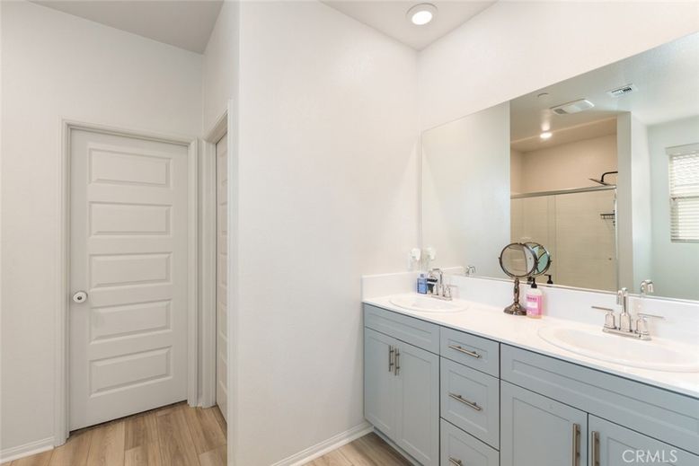 Bathroom, Dual Sink Vanities, Interior, Recessed Lighting, Wood Texture Flooring