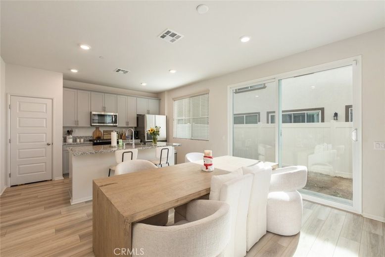 Dining room, Interior, Kitchen, Recessed Lighting, Stainless Steel Appliances, Wood Texture Flooring