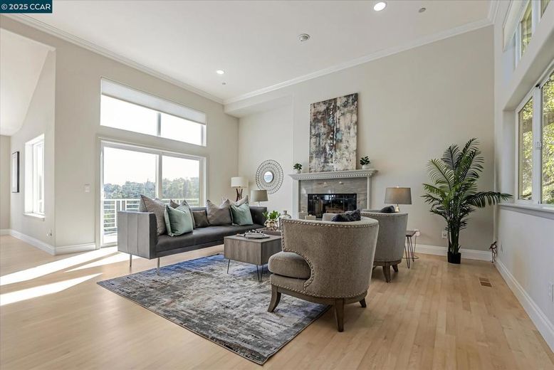 Dining room, Fireplace, Interior, Living room, Recessed Lighting, Wood Texture Flooring