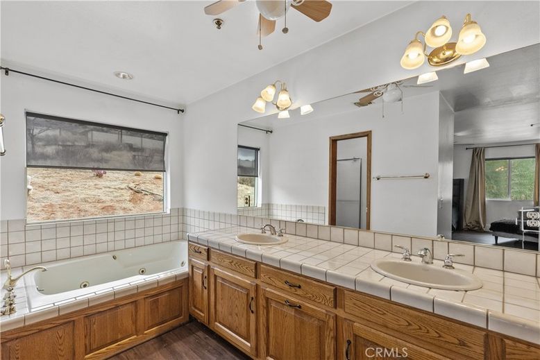 Bathroom, Dual Sink Vanities, Interior, Recessed Lighting, Tile Countertops, Wood Texture Flooring