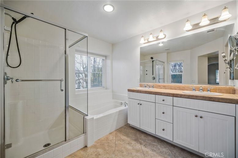 Bathroom, Dual Sink Vanities, Glass Shower, Interior, Recessed Lighting, Tile Countertops