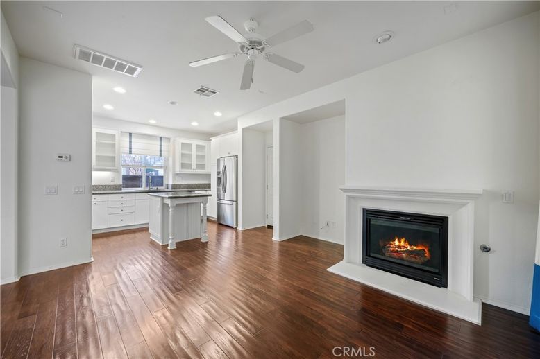 Empty room, Fireplace, Interior, Kitchen, Recessed Lighting, Wood Texture Flooring