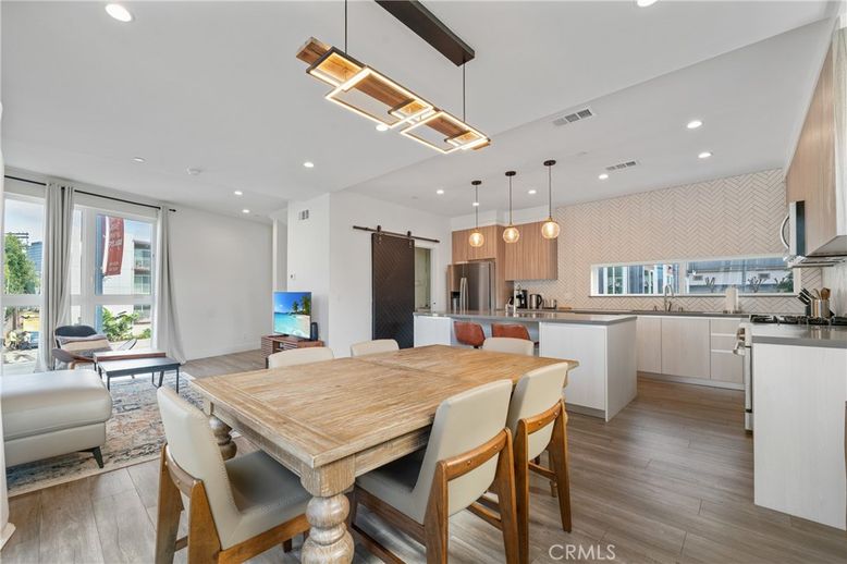 Dining room, Interior, Kitchen, Living room, Pendant Lights, Recessed Lighting, Stainless Steel Appliances, Wood Texture Flooring