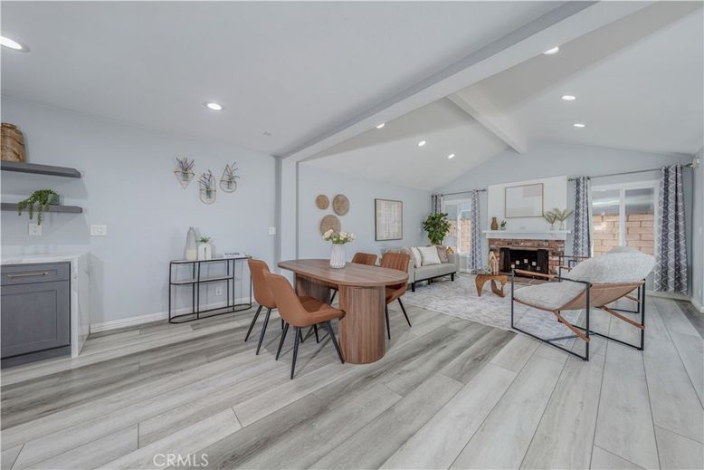 Dining room, Fireplace, Interior, Living room, Recessed Lighting, Wood Texture Flooring