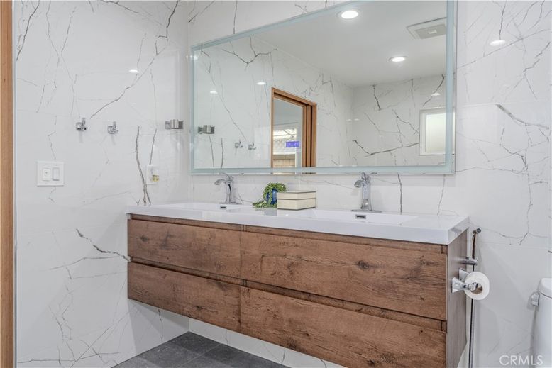 Bathroom, Dual Sink Vanities, Interior, Marble Walls, Recessed Lighting