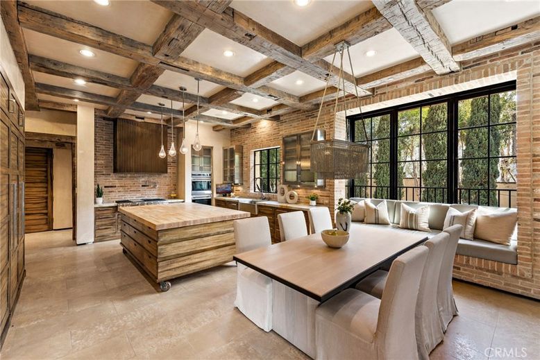 Dining room, Interior, Kitchen, Living room, Pendant Lights, Recessed Lighting, Stainless Steel Appliances, Stone Walls, Wooden Beams
