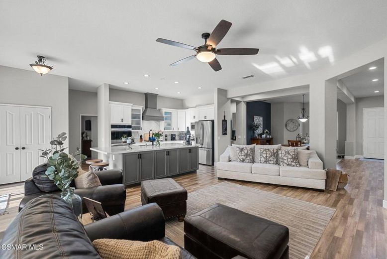 Dining room, Interior, Kitchen, Living room, Pendant Lights, Recessed Lighting, Stainless Steel Appliances, Wood Texture Flooring