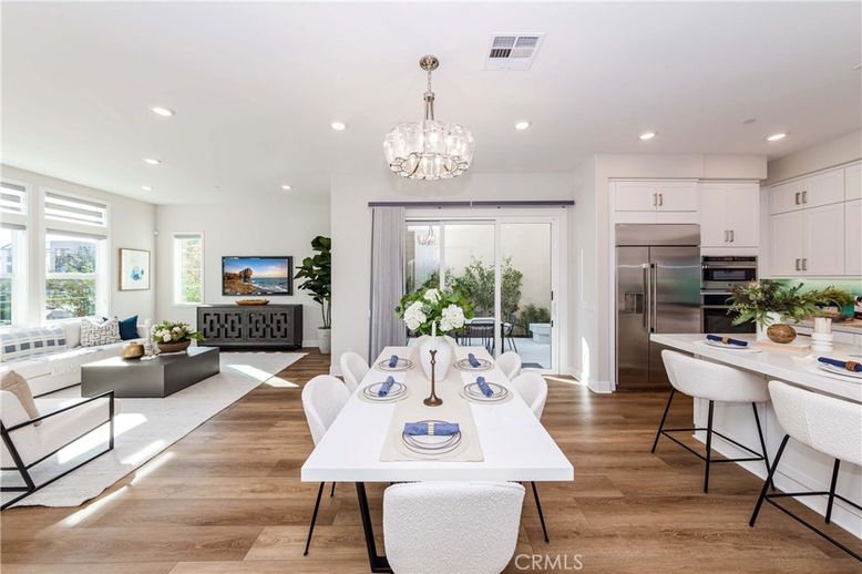 Chandelier, Dining room, Interior, Kitchen, Living room, Recessed Lighting, Stainless Steel Appliances, Wood Texture Flooring