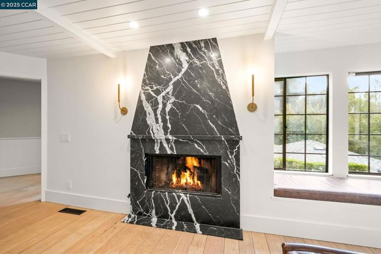Fireplace, Interior, Marble Walls, Recessed Lighting, Wood Texture Flooring