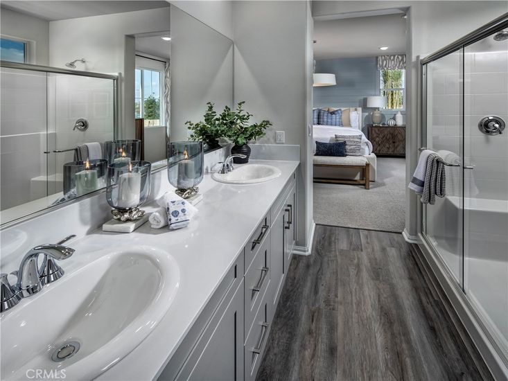 Bathroom, Bedroom, Dual Sink Vanities, Glass Shower, Interior, Recessed Lighting, Wood Texture Flooring