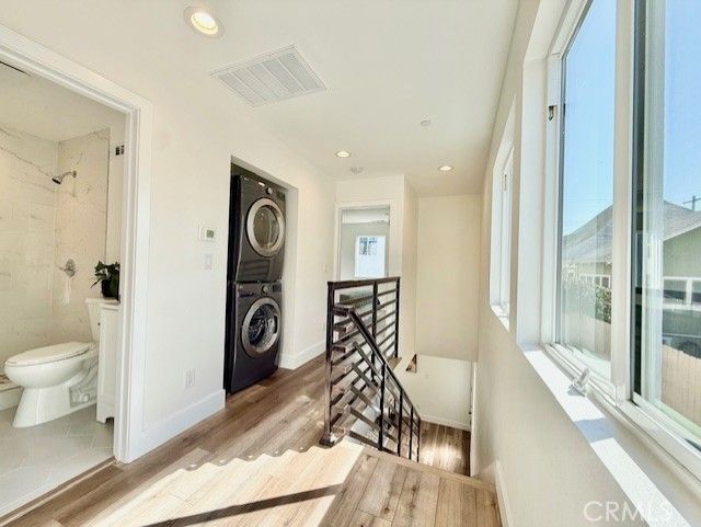 Bathroom, Interior, Recessed Lighting, Utility Closets, Washer, Wood Texture Flooring