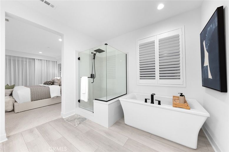 Bathroom, Bedroom, Free Standing Baths, Glass Shower, Interior, Recessed Lighting, Wood Texture Flooring