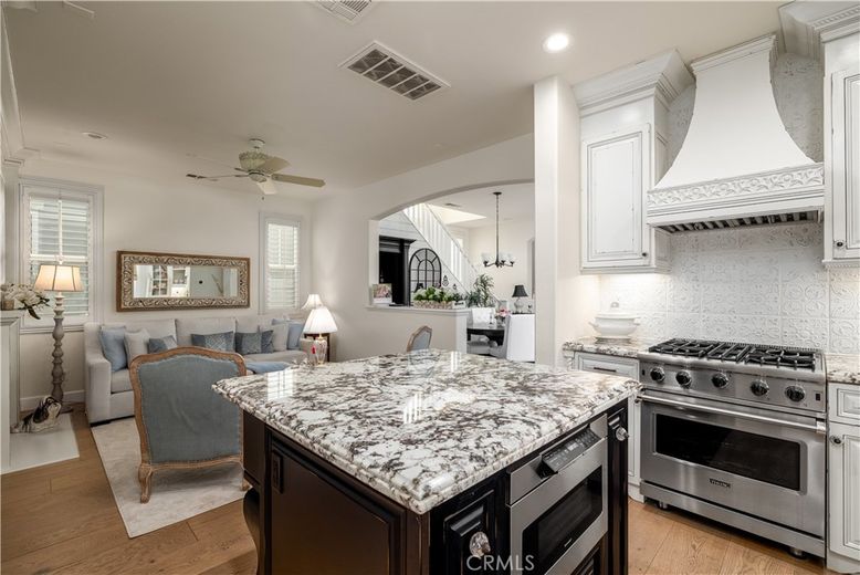 Dining room, Interior, Kitchen, Living room, Pendant Lights, Recessed Lighting, Stainless Steel Appliances, Wood Texture Flooring