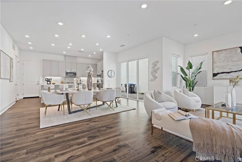 Dining room, Interior, Kitchen, Living room, Recessed Lighting, Stainless Steel Appliances, Wood Texture Flooring