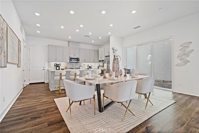 Dining room, Interior, Kitchen, Recessed Lighting, Stainless Steel Appliances, Wood Texture Flooring