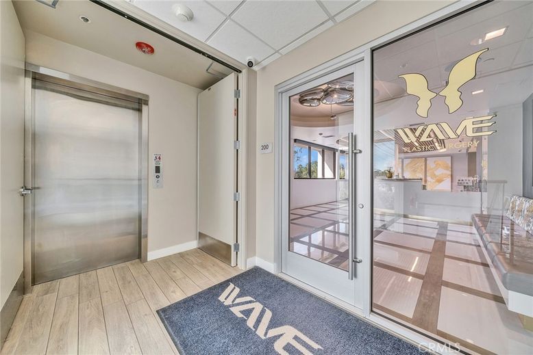 Elevator, Interior, Recessed Lighting, Wood Texture Flooring