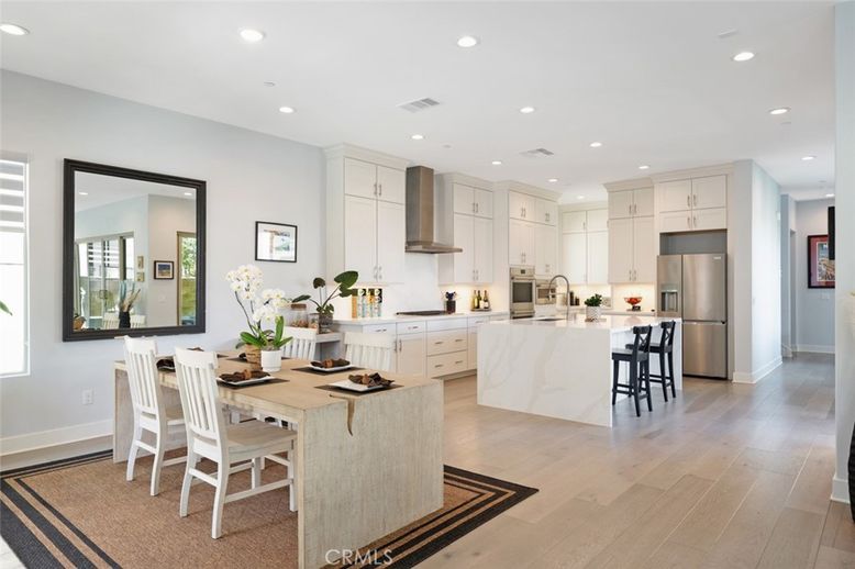 Dining room, Interior, Kitchen, Recessed Lighting, Stainless Steel Appliances, Wood Texture Flooring