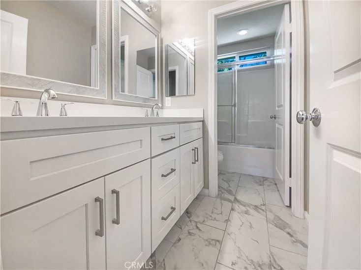 Bathroom, Dual Sink Vanities, Glass Shower, Interior, Marble, Recessed Lighting