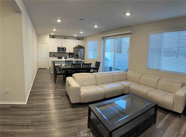 Dining room, Interior, Kitchen, Living room, Recessed Lighting, Stainless Steel Appliances, Wood Texture Flooring